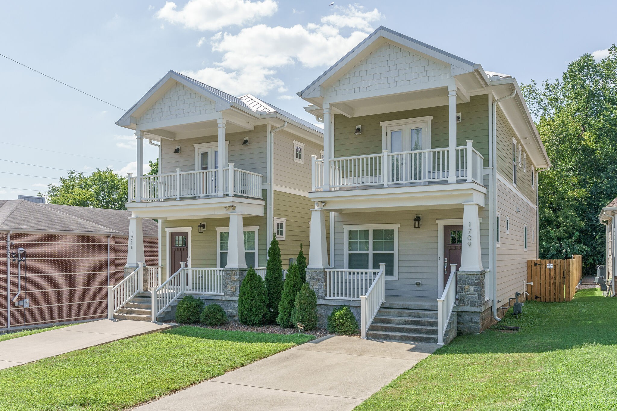 1711 Ridley Boulevard Nashville, TN 37203 - Photo 3 of 49 a front view of a house with a yard