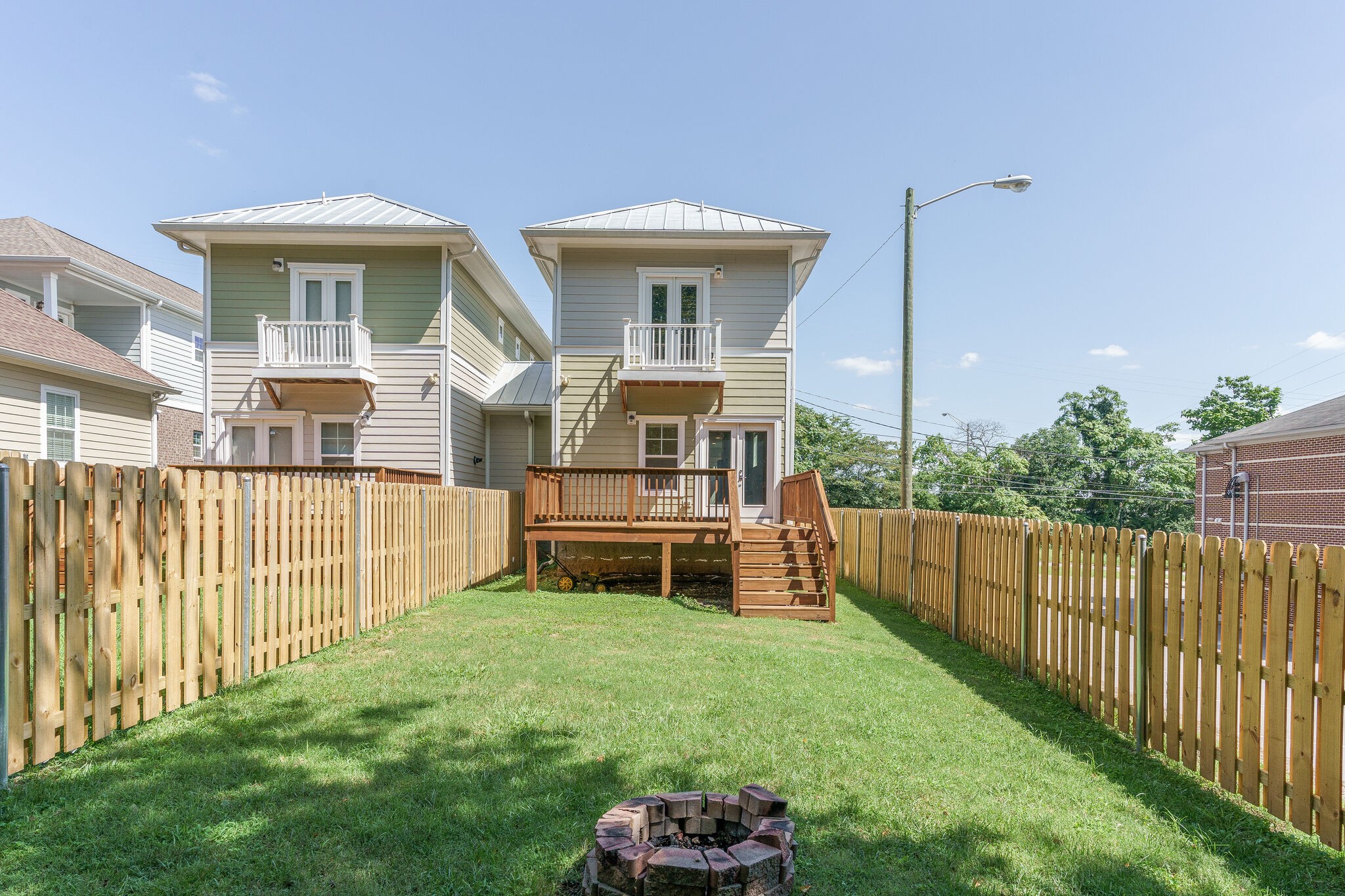 1711 Ridley Boulevard Nashville, TN 37203 - Photo 25 of 49 a view of a house with backyard and porch