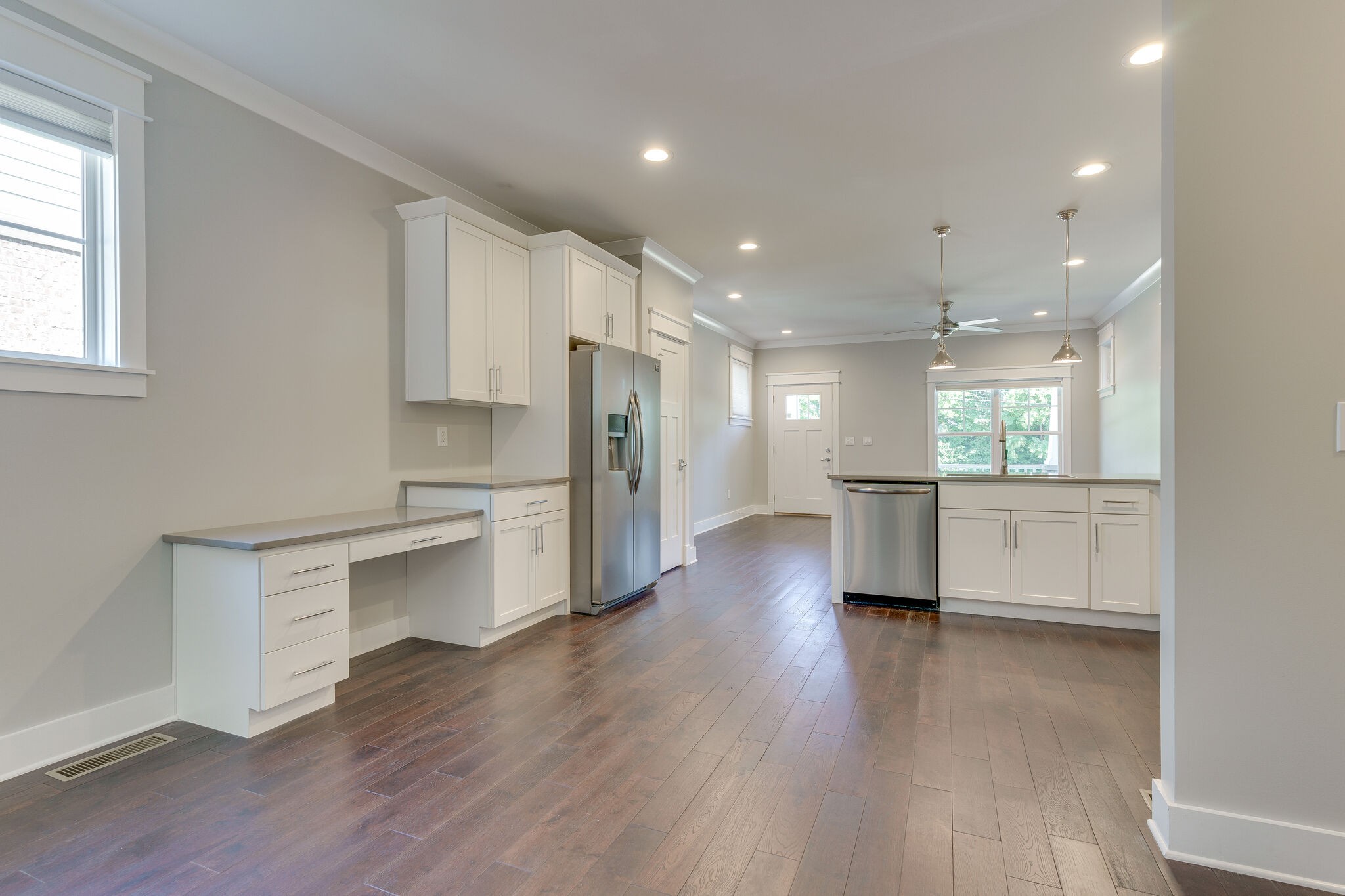 1711 Ridley Boulevard Nashville, TN 37203 - Photo 36 of 49 a view of a kitchen with a sink and a refrigerator