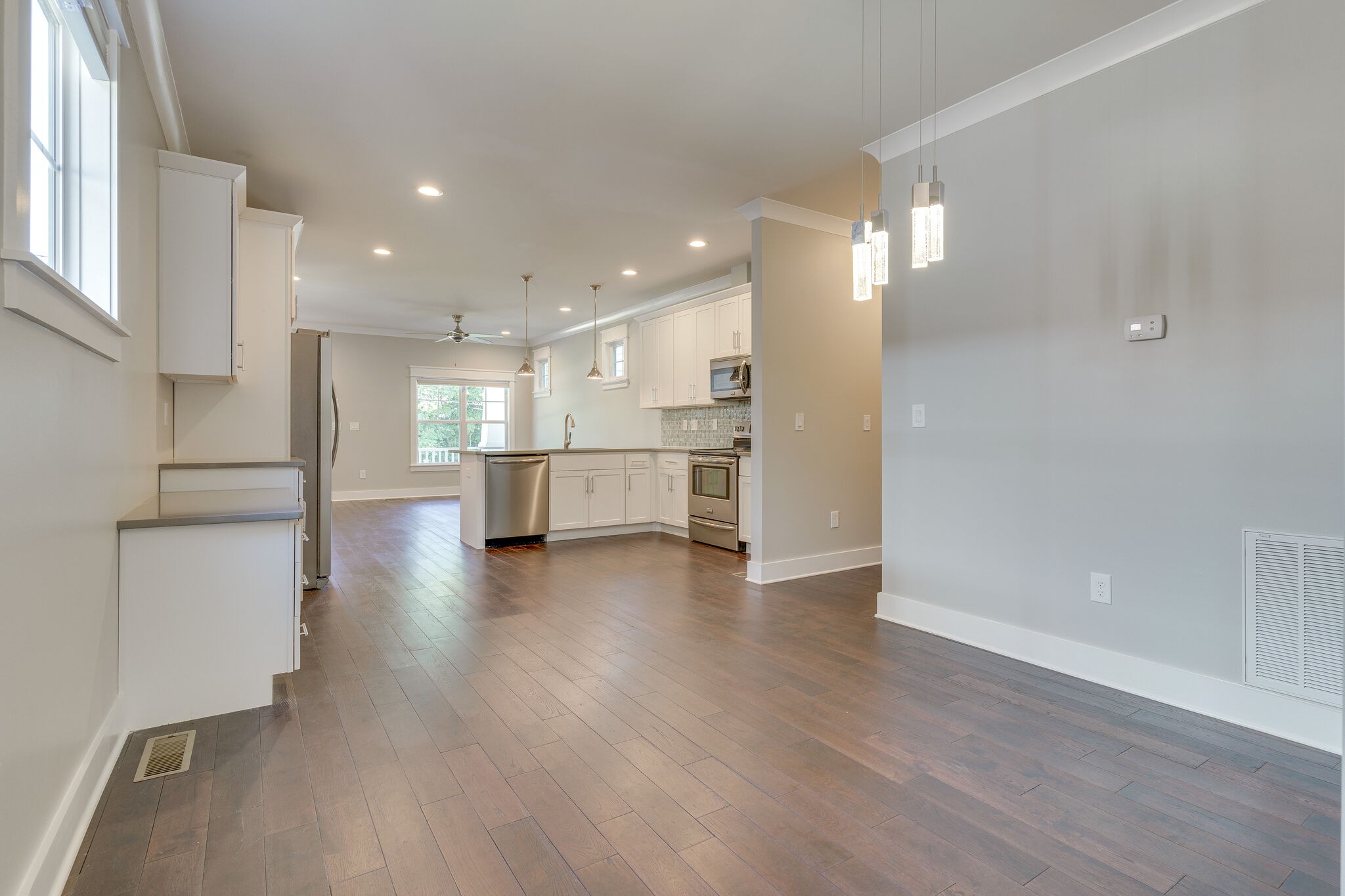 1711 Ridley Boulevard Nashville, TN 37203 - Photo 39 of 49 a view of kitchen with wooden floor and electronic appliances