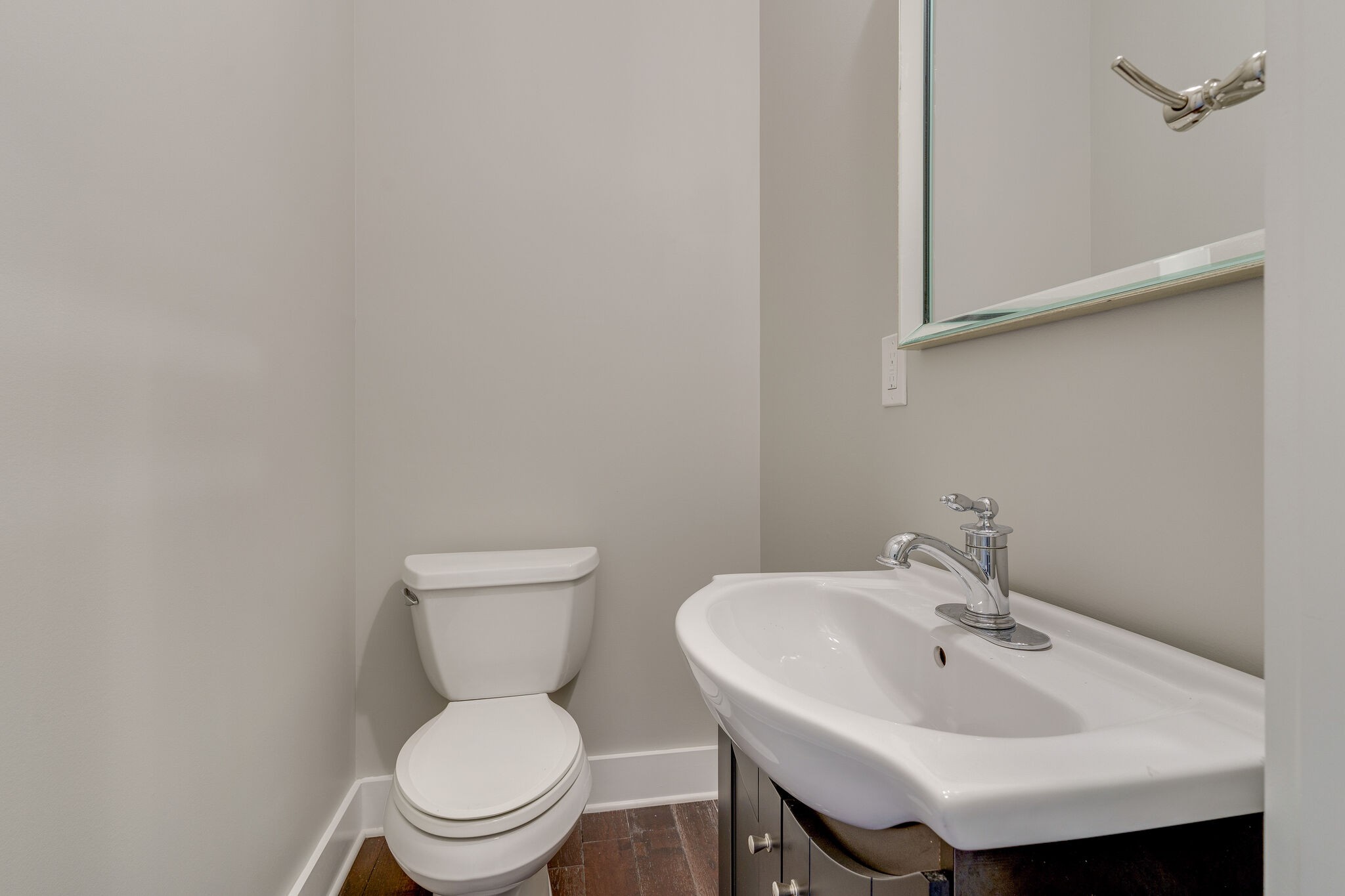 1711 Ridley Boulevard Nashville, TN 37203 - Photo 40 of 49 a bathroom with a sink a toilet and a mirror