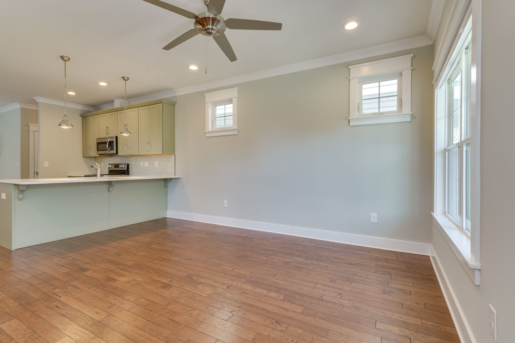 1711 Ridley Boulevard Nashville, TN 37203 - Photo 5 of 49 a view of a kitchen with marble kitchen and stainless steel appliances wooden floor