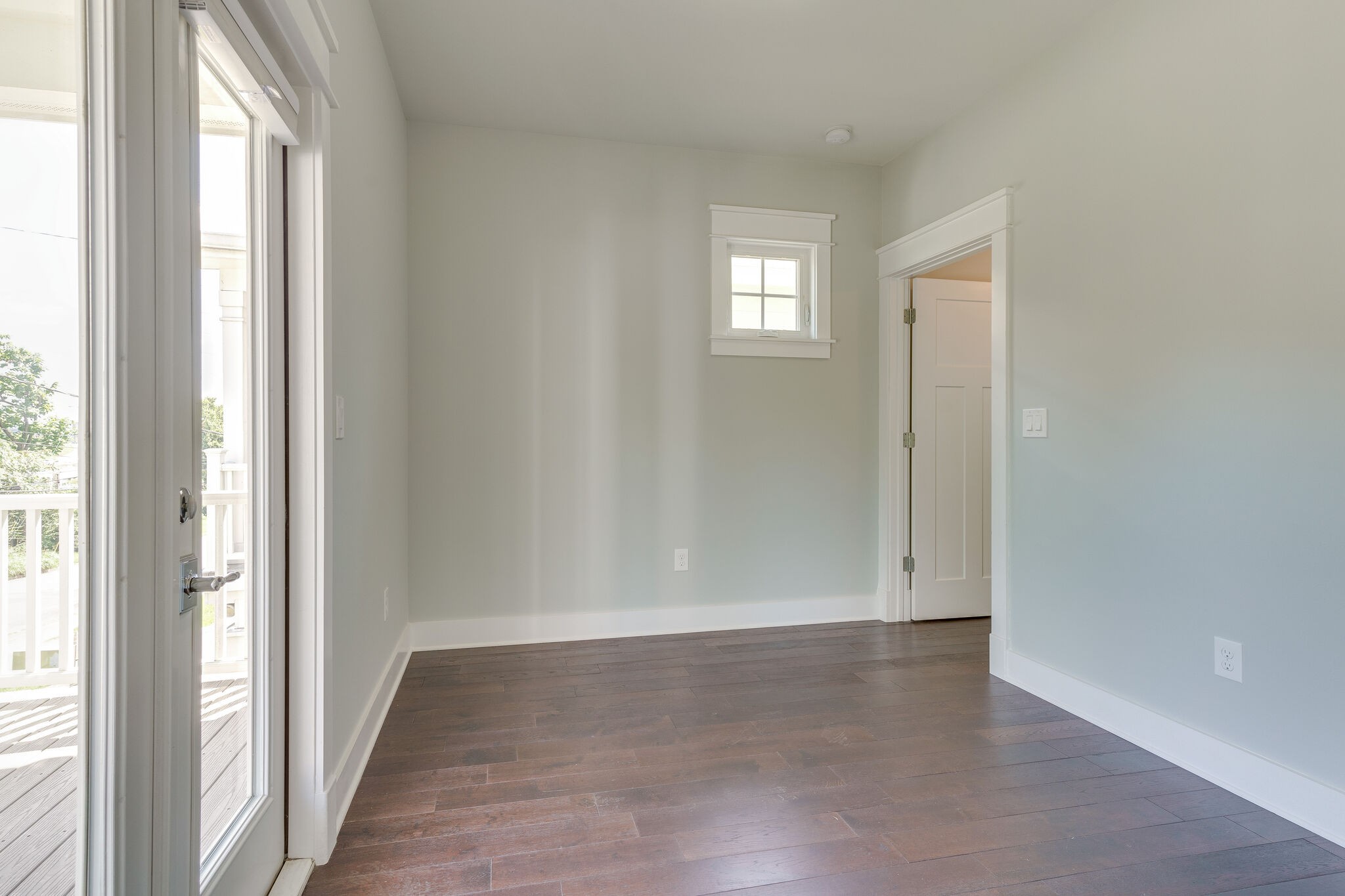 1711 Ridley Boulevard Nashville, TN 37203 - Photo 49 of 49 a view of an empty room with wooden floor and a window