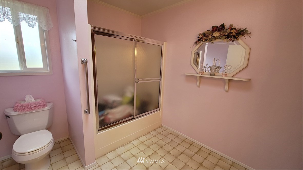171 Mantle Road Sequim, WA 98382 - Photo 11 of 34 a bathroom with a toilet and a shower