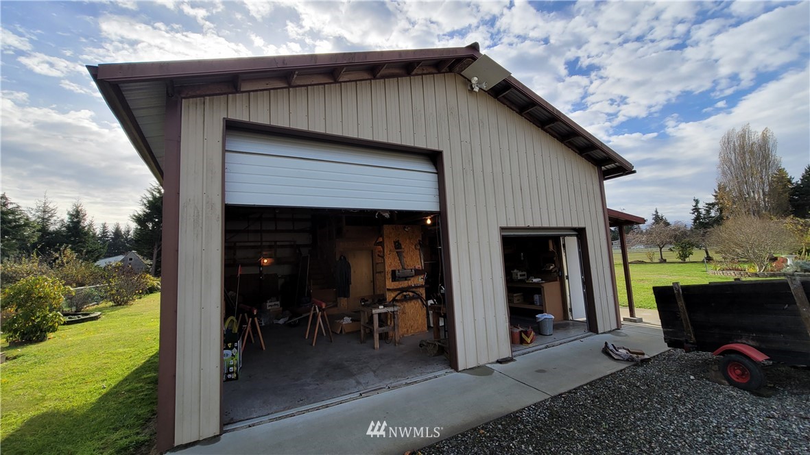 171 Mantle Road Sequim, WA 98382 - Photo 20 of 34 a front view of a house with yard