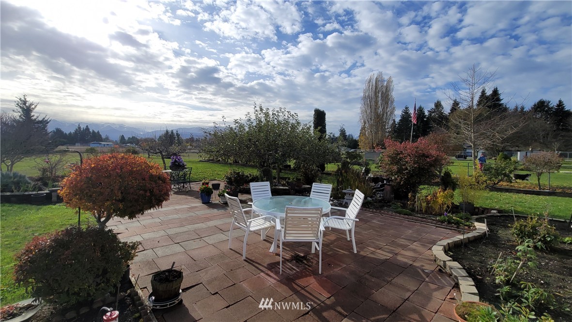 171 Mantle Road Sequim, WA 98382 - Photo 26 of 34 a view of a backyard with sitting area