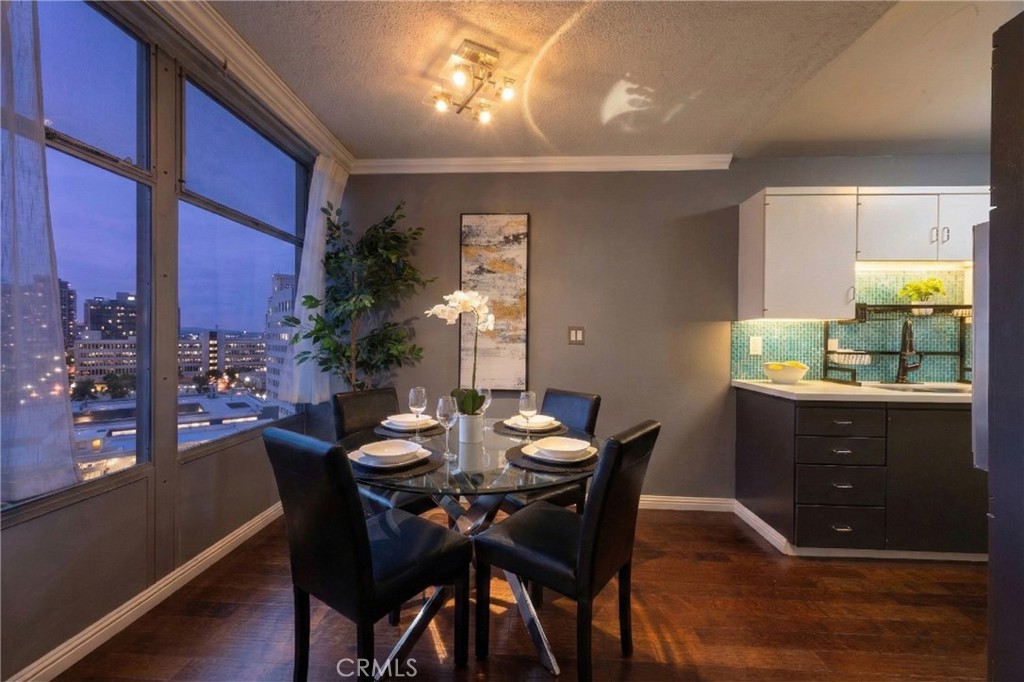 100 Atlantic Avenue, Unit 902 Long Beach, CA 90802 - Photo 1 of 28 a view of a dining room with furniture and window