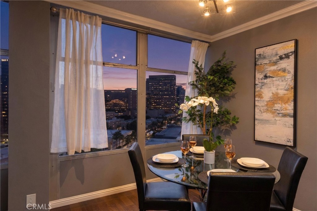 100 Atlantic Avenue, Unit 902 Long Beach, CA 90802 - Photo 2 of 28 a dining room with furniture window and wooden floor