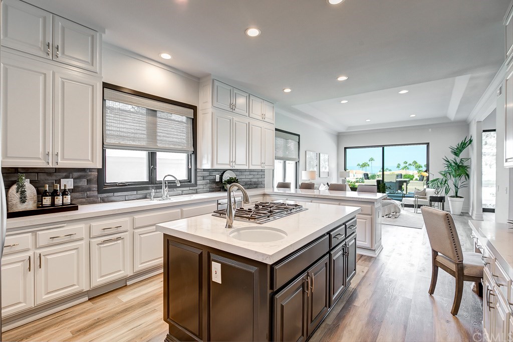 11 Marbella Dana Point, CA 92629 - Photo 17 of 50 a kitchen with a sink stove and cabinets