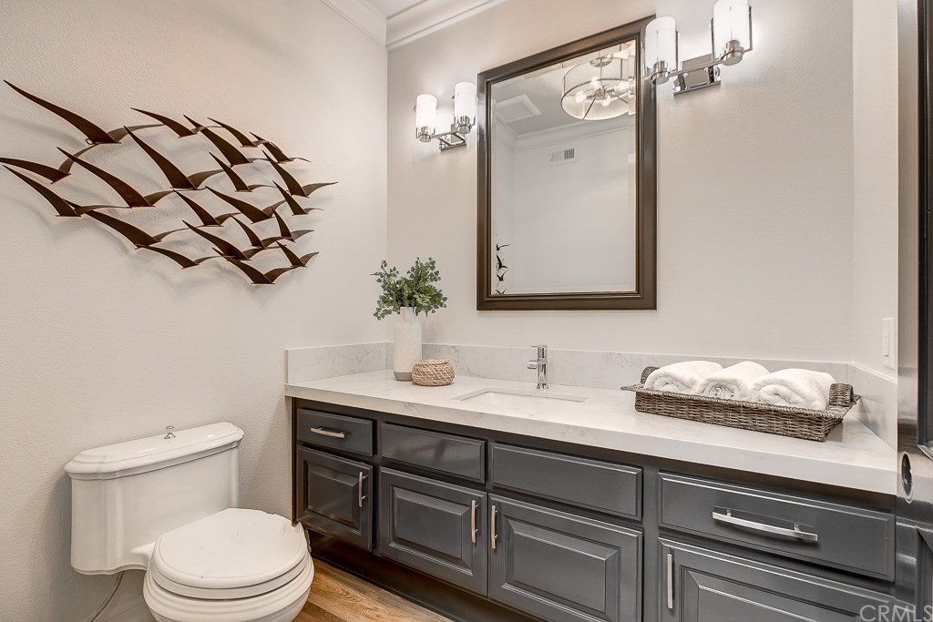 11 Marbella Dana Point, CA 92629 - Photo 18 of 50 a bathroom with a granite countertop sink mirror vanity and toilet