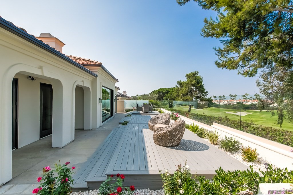 11 Marbella Dana Point, CA 92629 - Photo 38 of 50 a view of a house with swimming pool and a garden