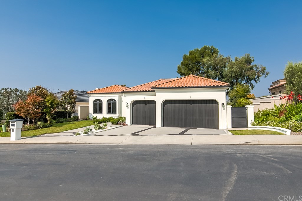 11 Marbella Dana Point, CA 92629 - Photo 49 of 50 a front view of a house with a yard