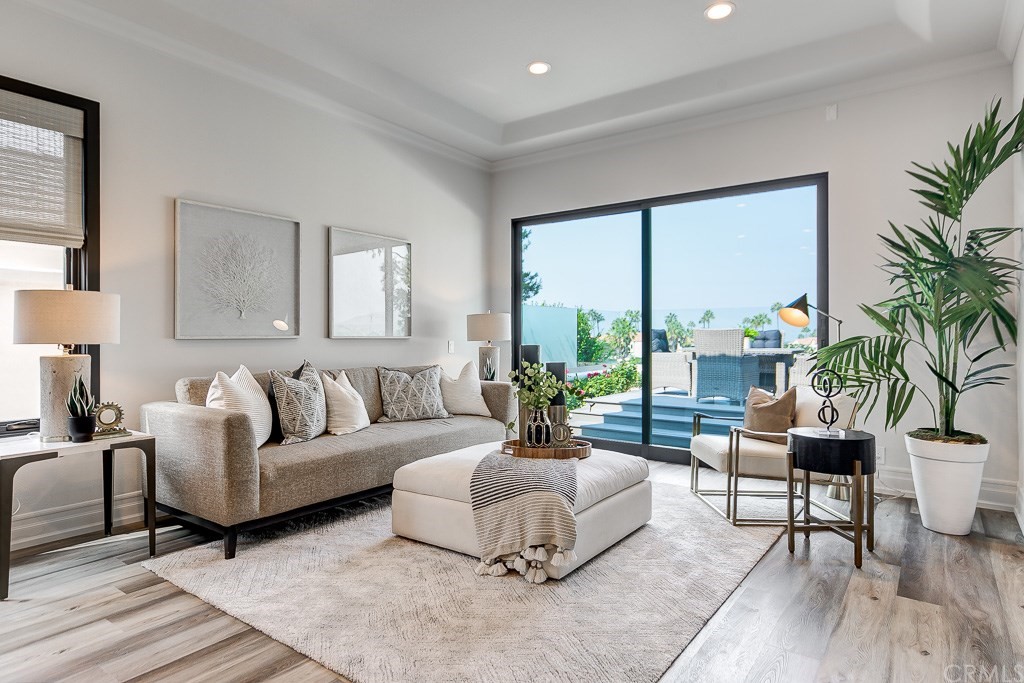 11 Marbella Dana Point, CA 92629 - Photo 9 of 50 a living room with furniture and a large window