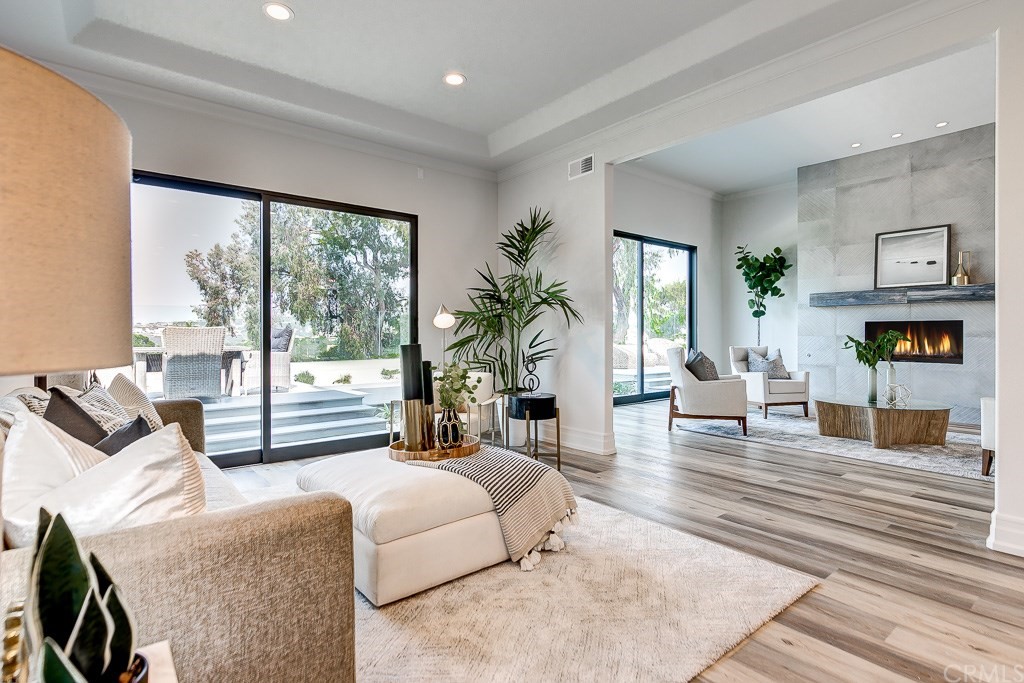 11 Marbella Dana Point, CA 92629 - Photo 10 of 50 a living room with furniture large window and a flat screen tv