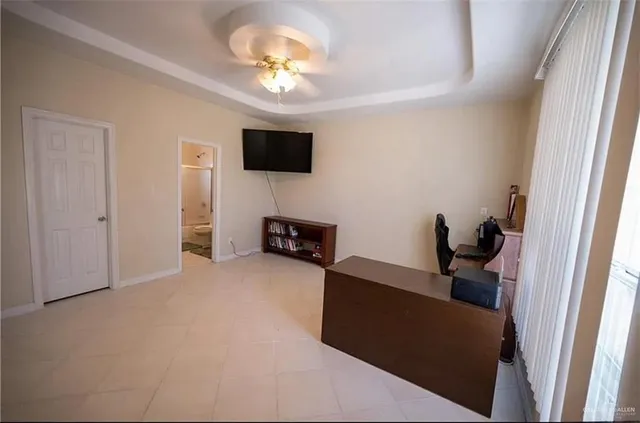 a view of a livingroom with a flat screen tv