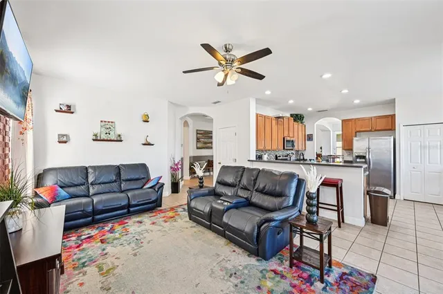 a living room with furniture and a window