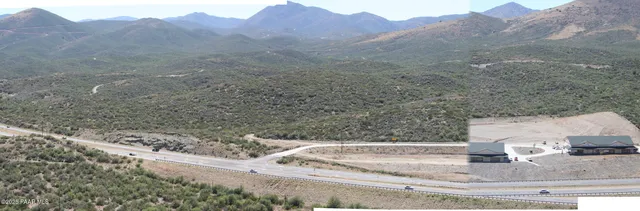a view of a mountain with sunset view