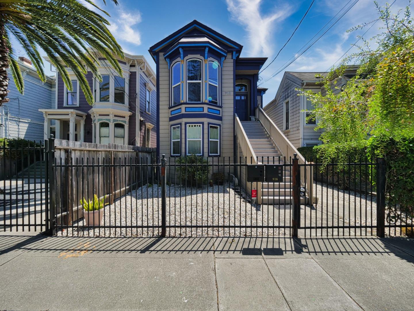 a view of a brick house with many windows