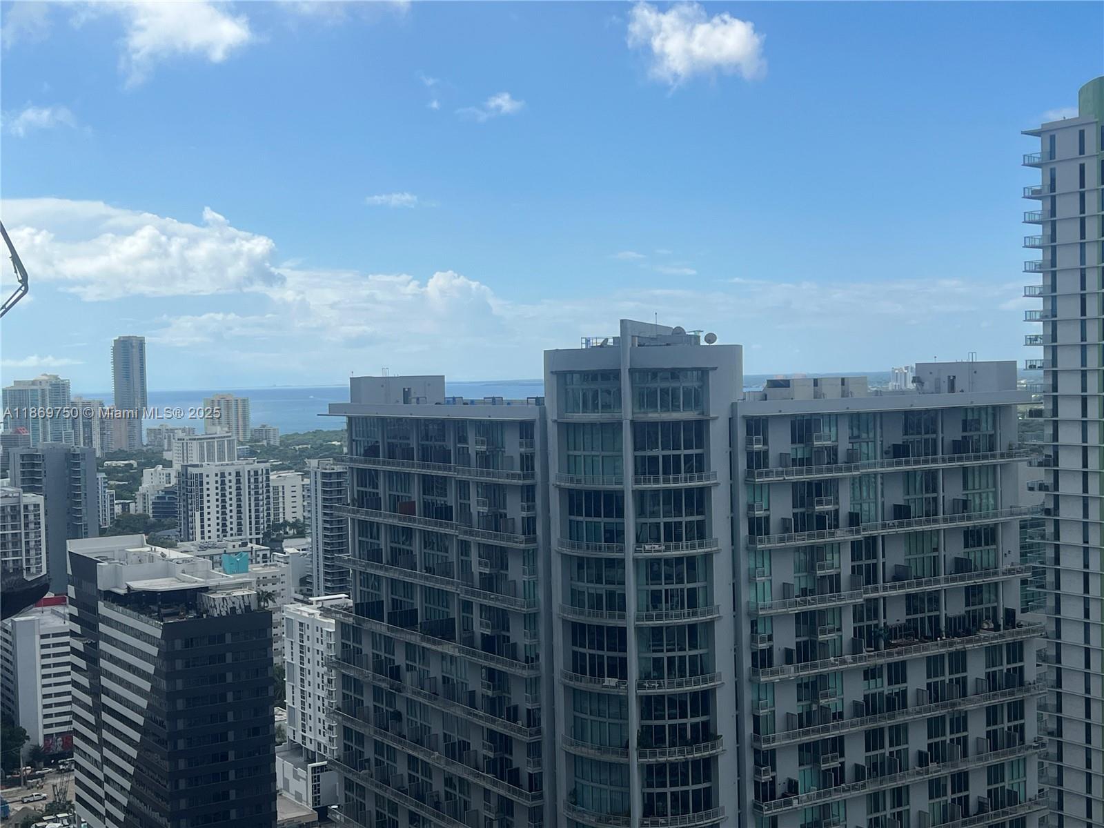 92 Southwest 3rd Street, Unit 3803 Miami, FL 33130 - Photo 29 of 31 a view of a city with tall buildings