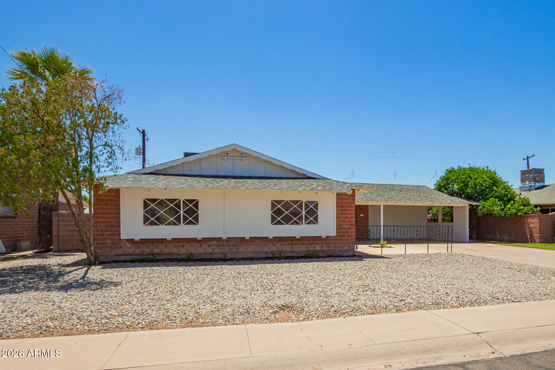 3913 West Krall Street Phoenix, AZ 85019 - Photo 1 of 35 a view of a sign in front of a house