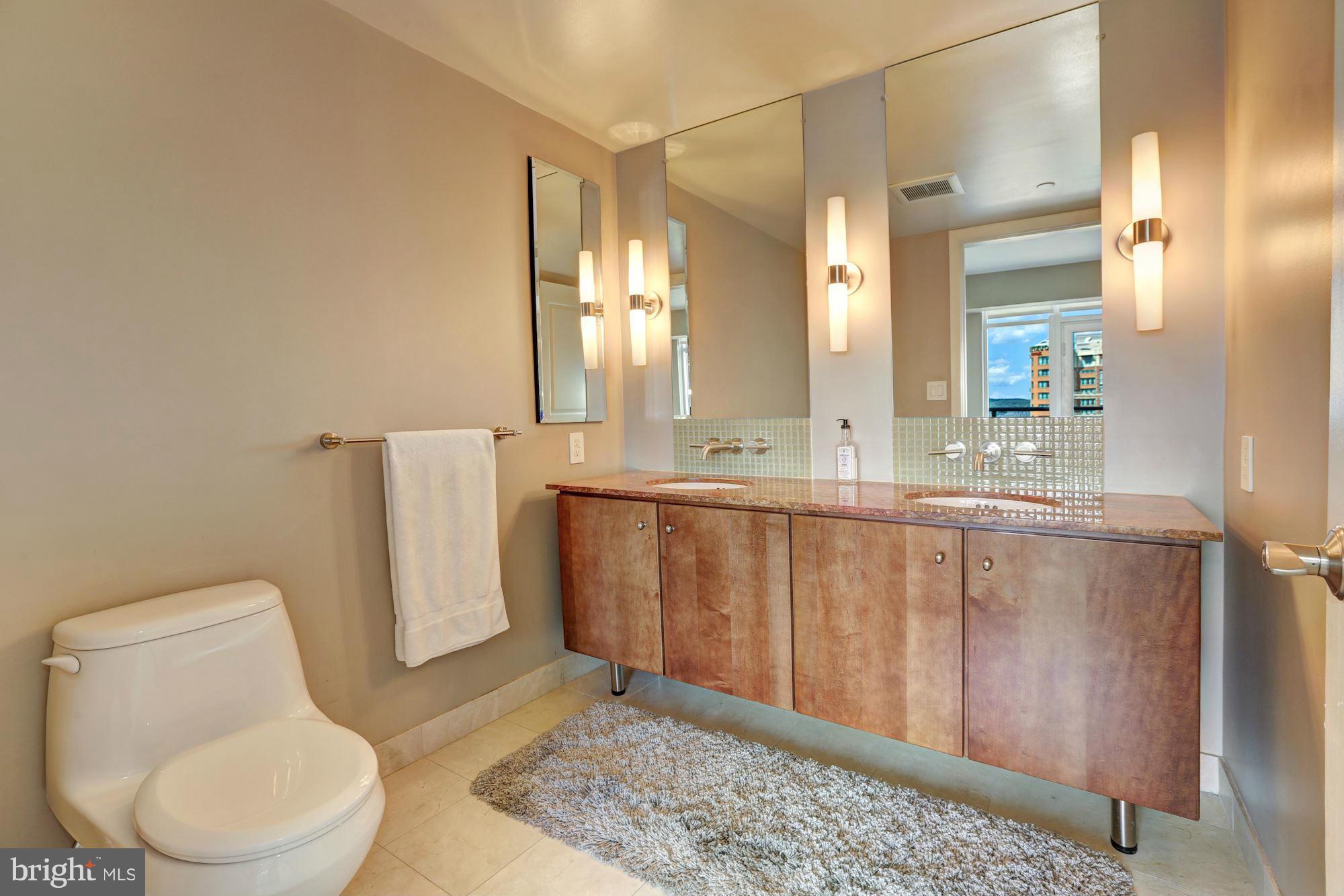 1025 First Street Southeast, Unit 1013 Washington, DC 20003 - Photo 10 of 26 Owner Bath w/ double-vanity