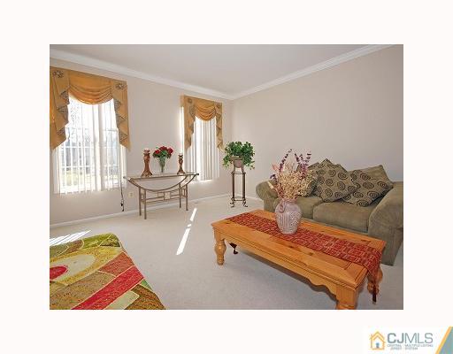 3 Stratton Road Old Bridge, NJ 07747 - Photo 3 of 10 a living room with furniture and a couch