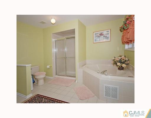 3 Stratton Road Old Bridge, NJ 07747 - Photo 8 of 10 a bathroom with a bathtub shower sink and toilet