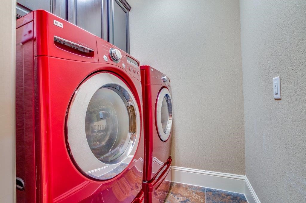 46 East Rafters Row The Woodlands, TX 77380 - Photo 16 of 25 Second floor washer and dryer included in a dedicated laundry room for everyday convenience.