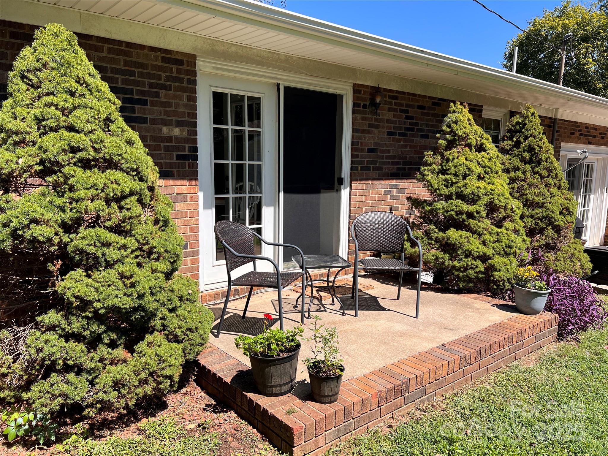 38430 Airport Road Albemarle, NC 28001 - Photo 13 of 39 a bench is sitting in front of a building