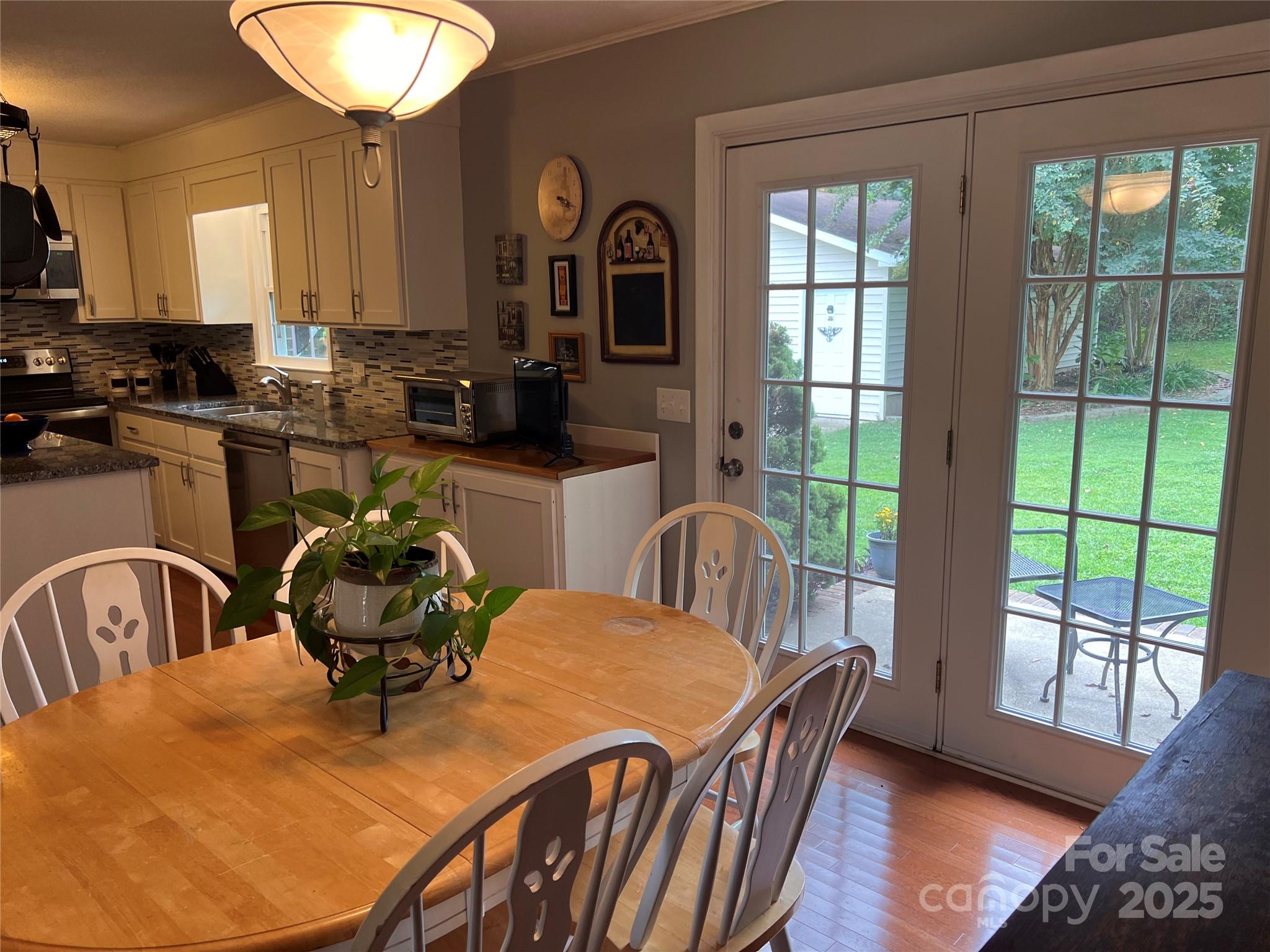 38430 Airport Road Albemarle, NC 28001 - Photo 18 of 39 a view of a dining room with furniture window and outside view