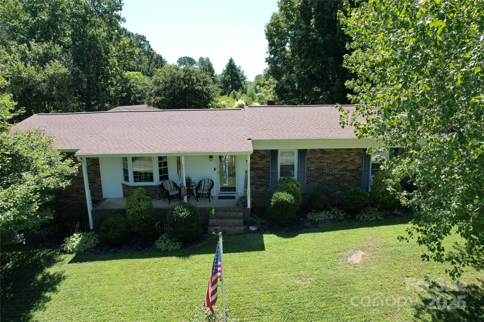 38430 Airport Road Albemarle, NC 28001 - Photo 3 of 39 a view of house with garden space and sitting area