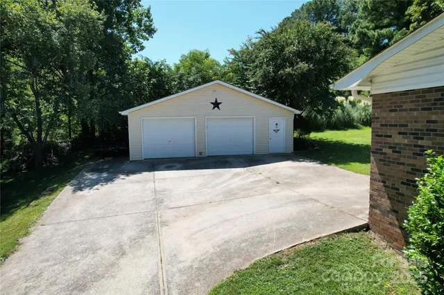 a house with trees in the background