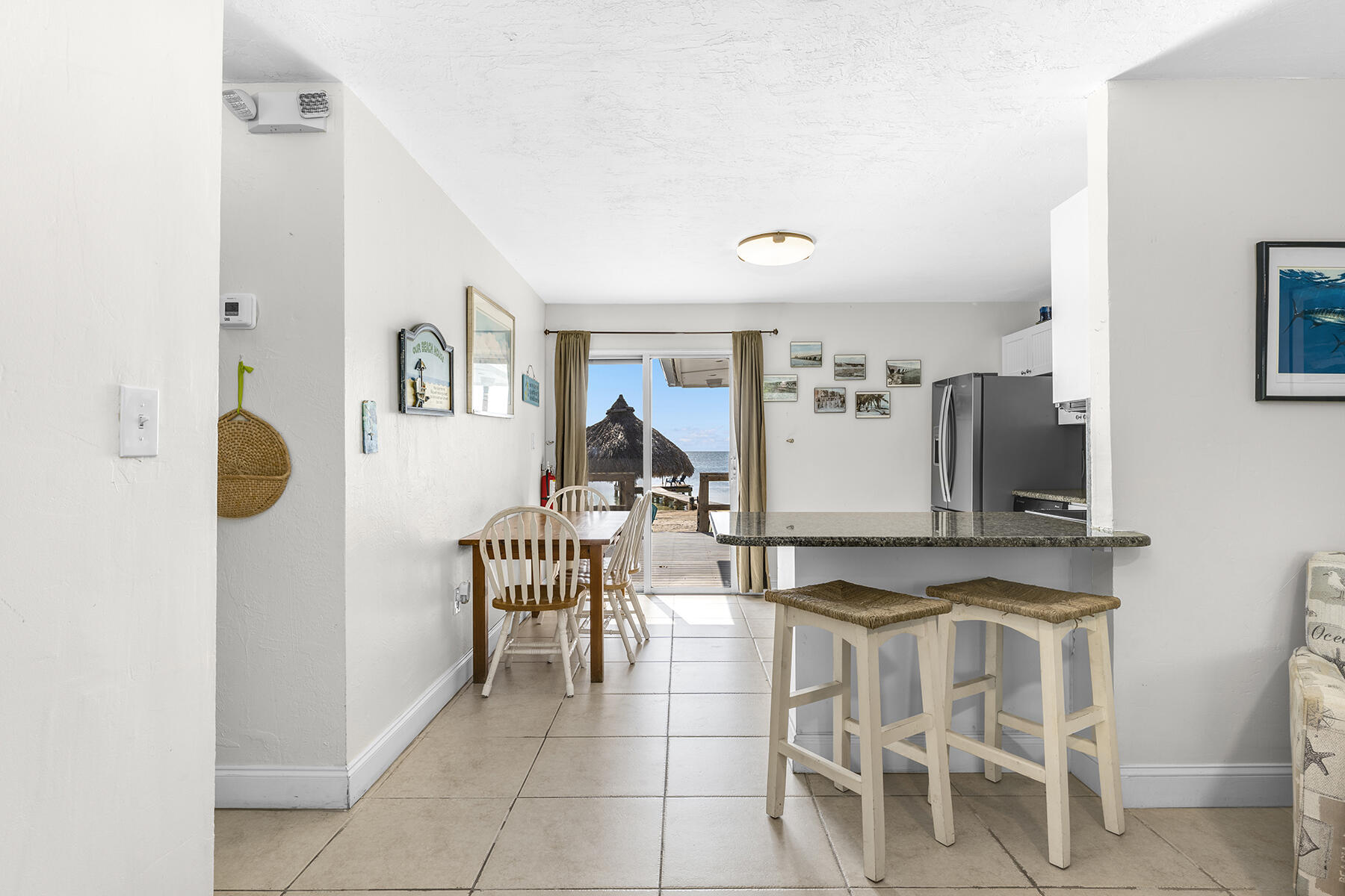 65620 Overseas Highway Long Key, FL 33001 - Photo 22 of 65 a living room with furniture a rug and white walls