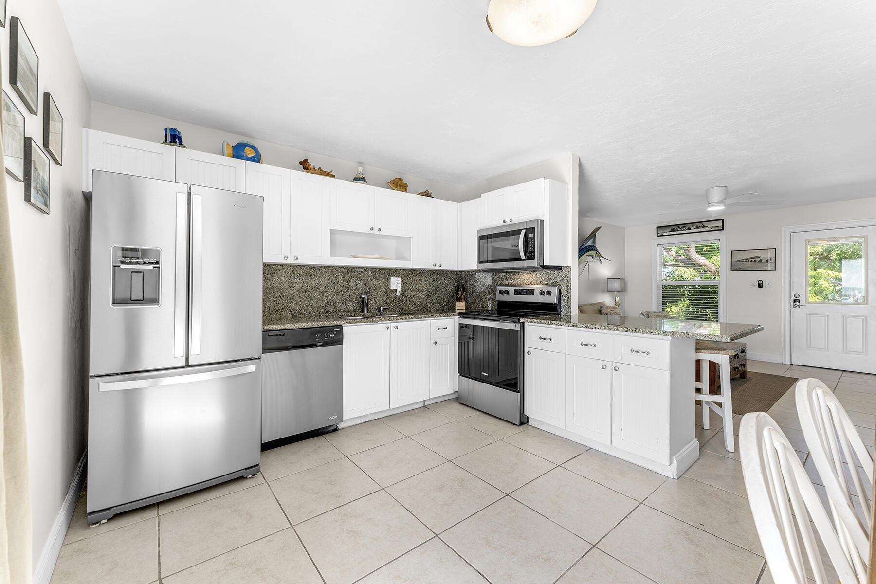 65620 Overseas Highway Long Key, FL 33001 - Photo 25 of 65 a kitchen with stainless steel appliances a refrigerator sink and microwave