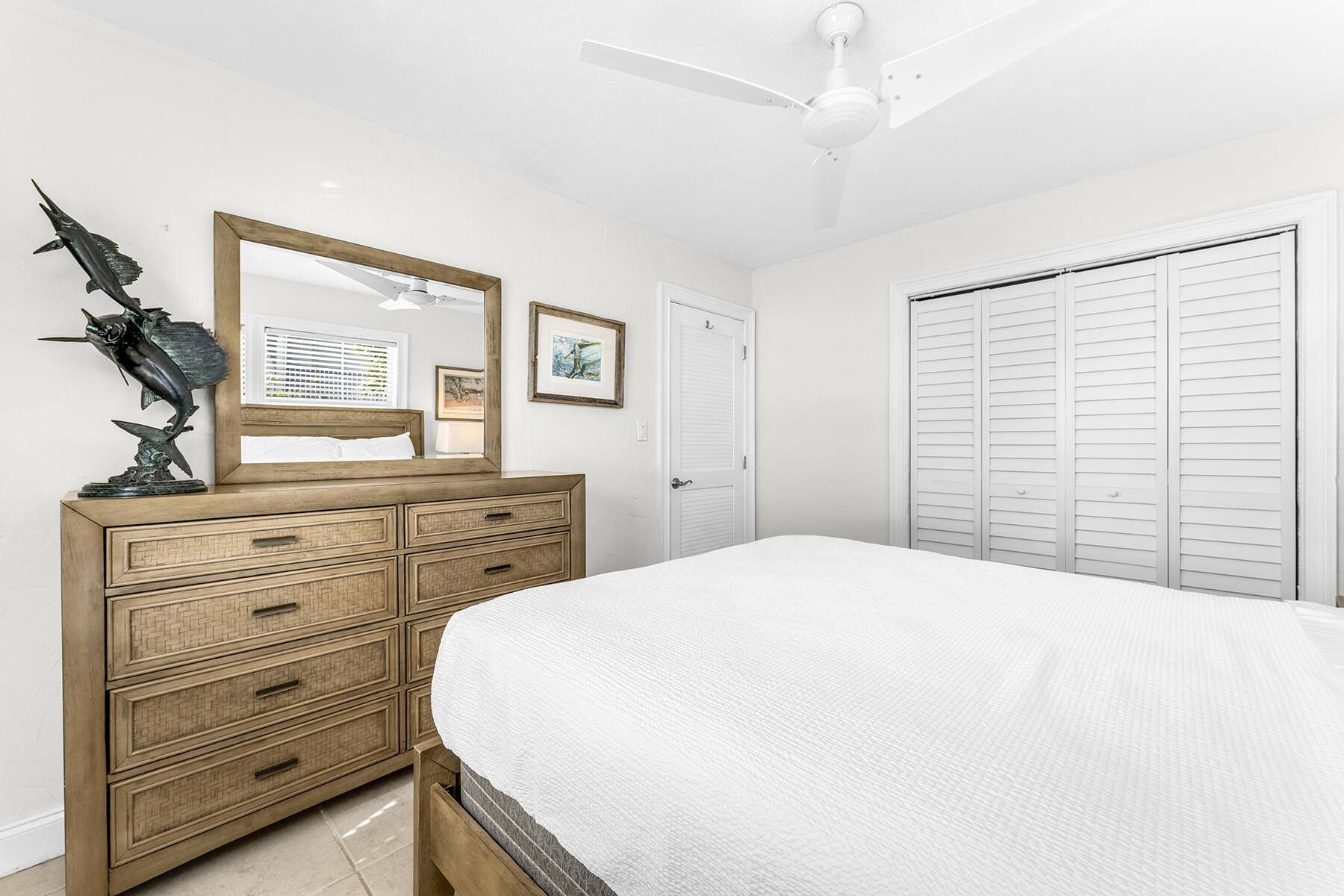 65620 Overseas Highway Long Key, FL 33001 - Photo 30 of 65 a bedroom with a bed and a dresser