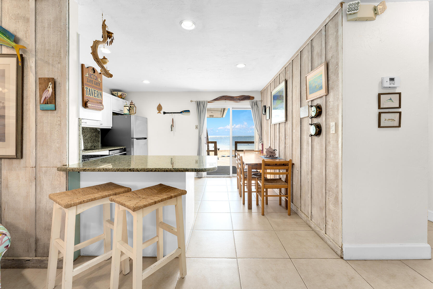 65620 Overseas Highway Long Key, FL 33001 - Photo 45 of 65 a kitchen with stainless steel appliances granite countertop a stove and a sink