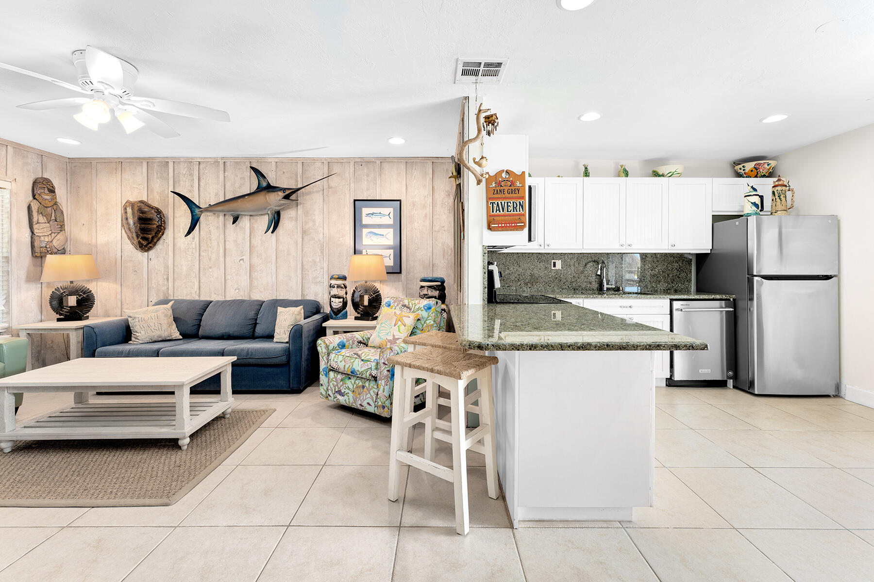 65620 Overseas Highway Long Key, FL 33001 - Photo 65 of 65 a kitchen with stainless steel appliances a refrigerator sink and white cabinets