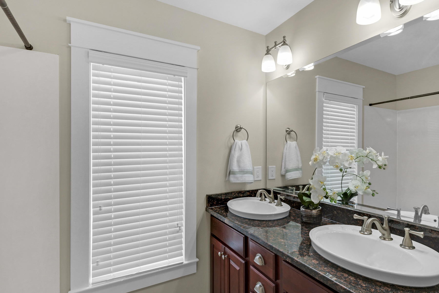 7 Seaspring Cove Santa Rosa Beach, FL 32459 - Photo 13 of 46 a bathroom with a sink double vanity and a mirror