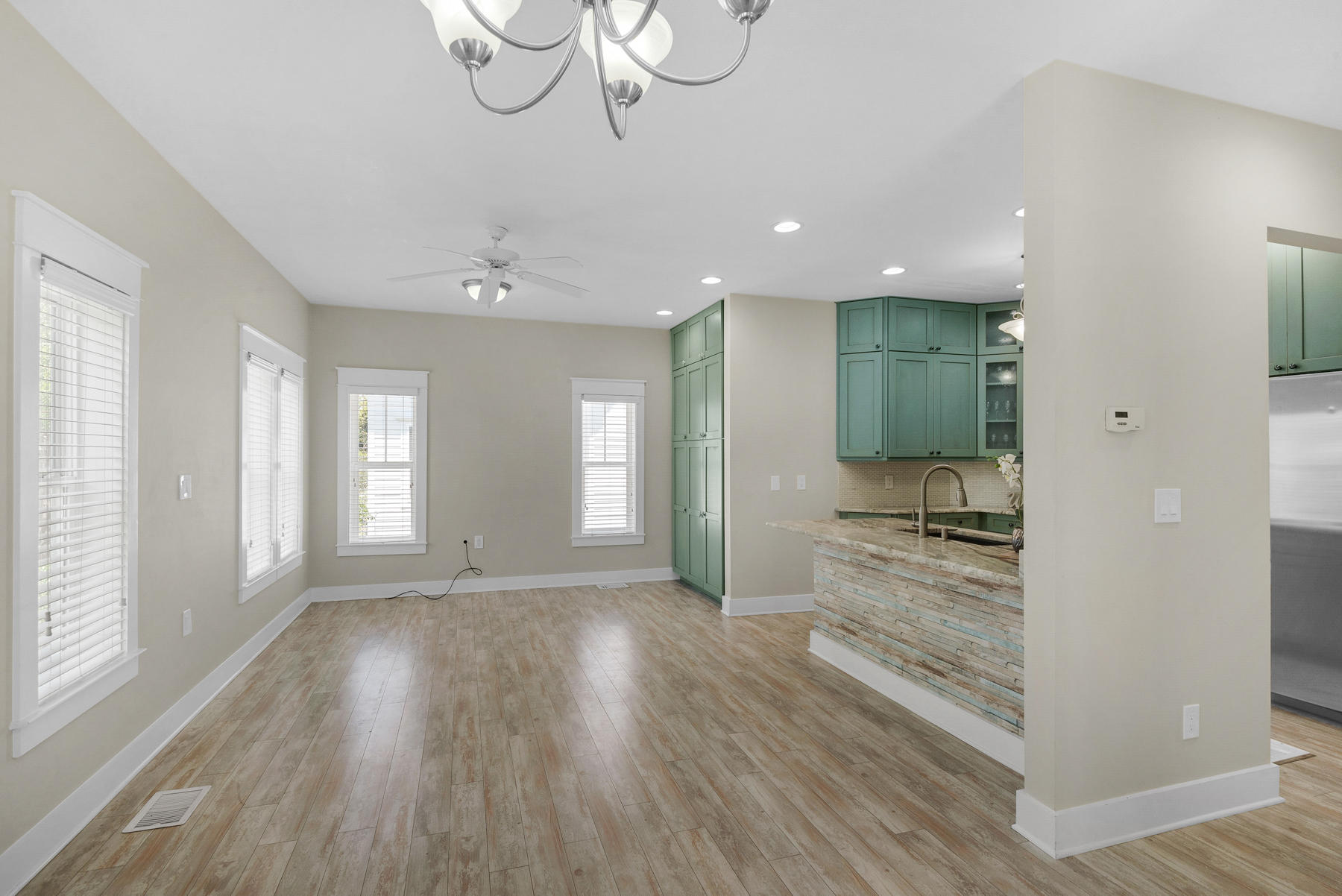 7 Seaspring Cove Santa Rosa Beach, FL 32459 - Photo 16 of 46 a view of a room with wooden floor and window