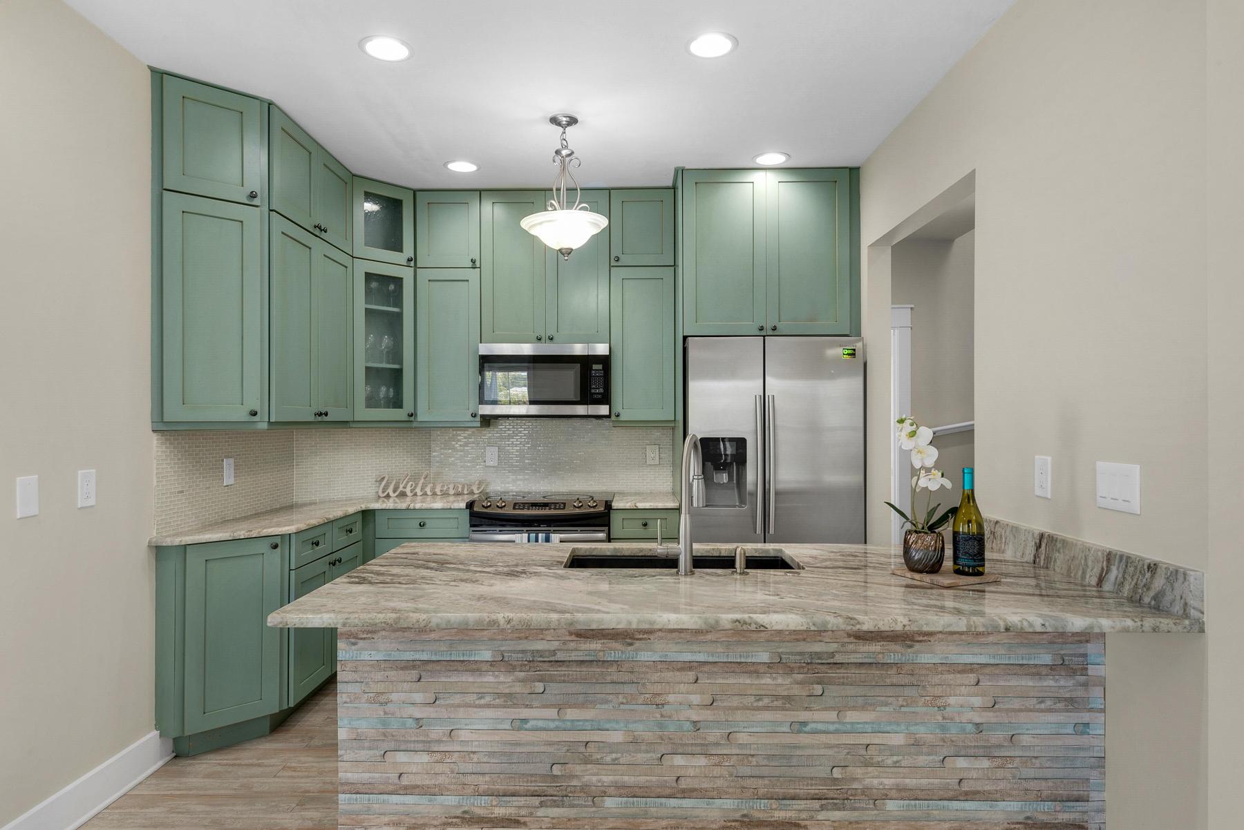 7 Seaspring Cove Santa Rosa Beach, FL 32459 - Photo 20 of 46 a view of a kitchen with stainless steel appliances granite countertop a refrigerator a stove and a sink