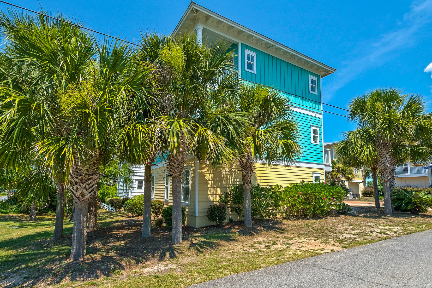 7 Seaspring Cove Santa Rosa Beach, FL 32459 - Photo 3 of 46 a front view of a house with a yard