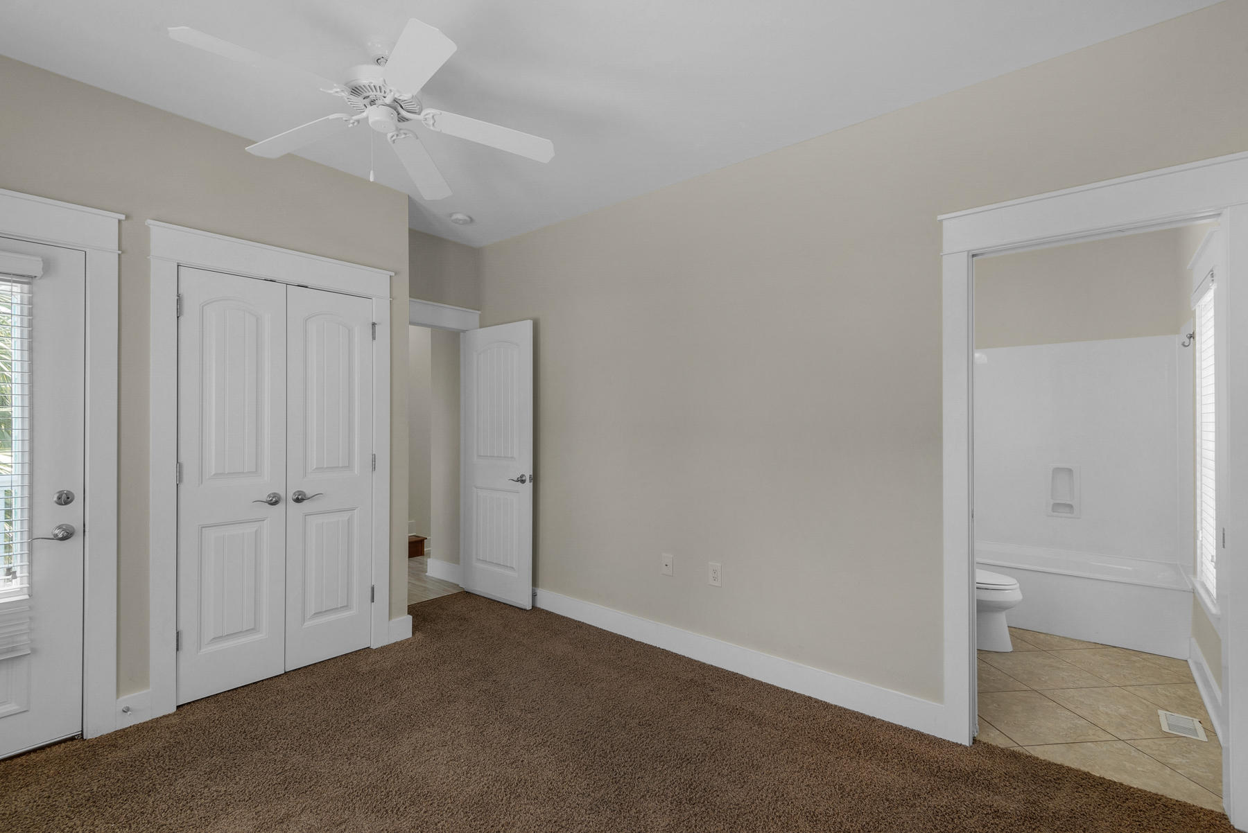 7 Seaspring Cove Santa Rosa Beach, FL 32459 - Photo 29 of 46 a view of empty room with a ceiling fan