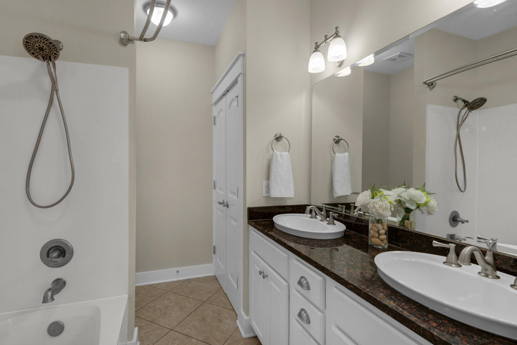 7 Seaspring Cove Santa Rosa Beach, FL 32459 - Photo 36 of 46 a bathroom with a granite countertop sink and a mirror