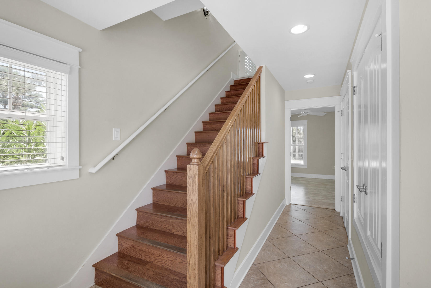 7 Seaspring Cove Santa Rosa Beach, FL 32459 - Photo 8 of 46 a view of a hallway with wooden floor and entryway