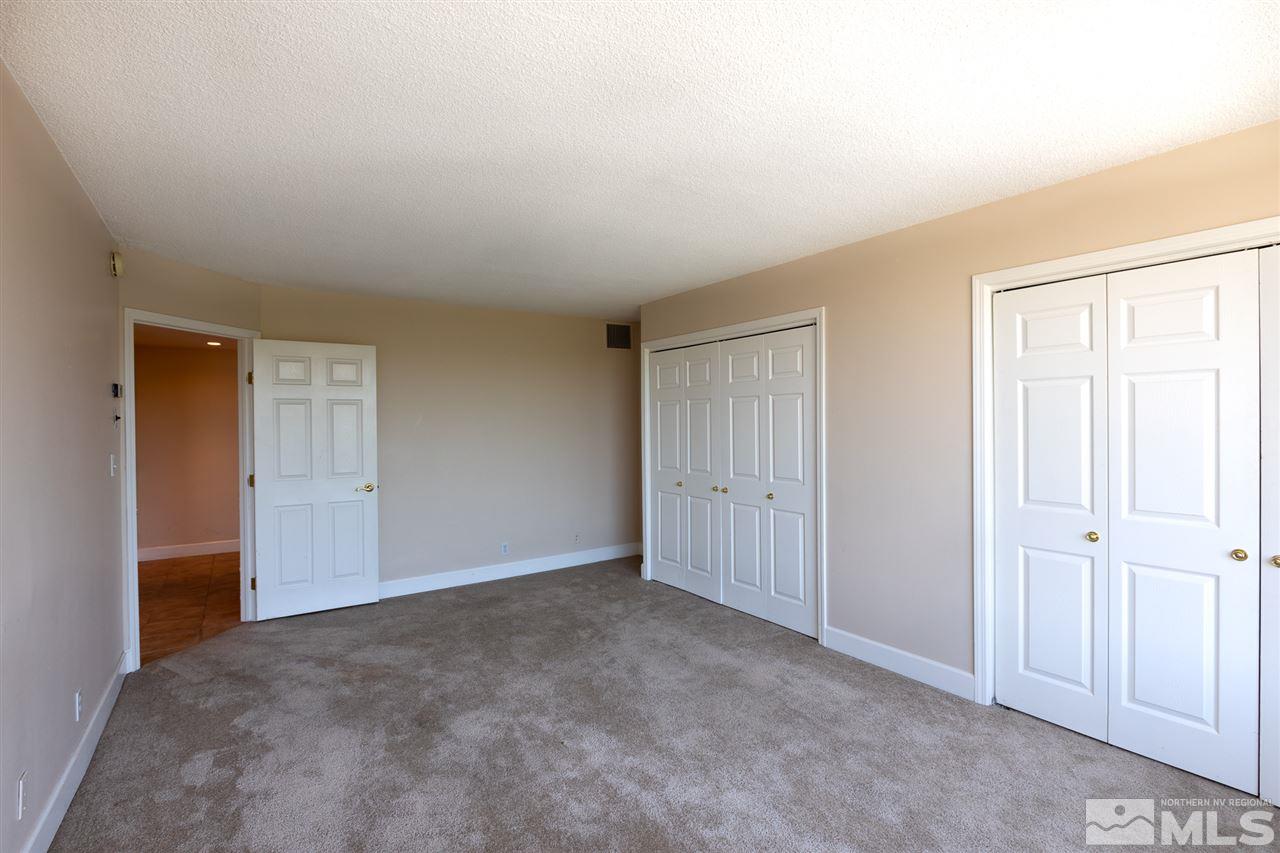 280 Island, Unit 703 Reno, NV 89501 - Photo 17 of 34 a view of an empty room and closet area