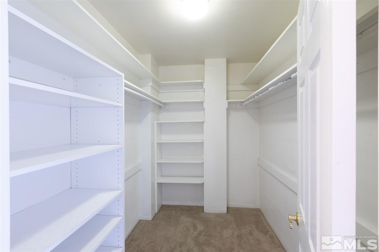 280 Island, Unit 703 Reno, NV 89501 - Photo 23 of 34 a view of walk in closet with empty racks