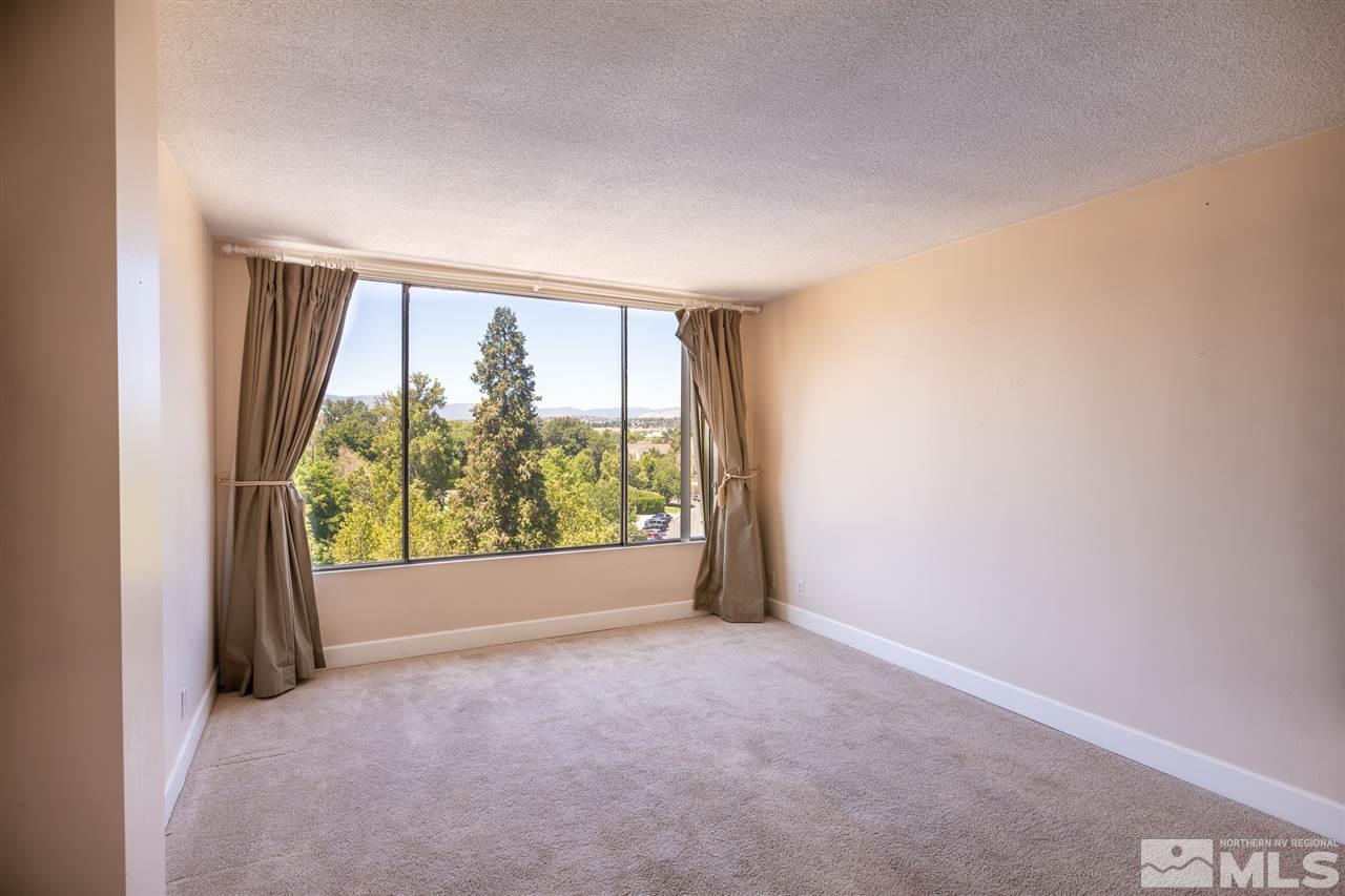 280 Island, Unit 703 Reno, NV 89501 - Photo 25 of 34 an empty room with large windows