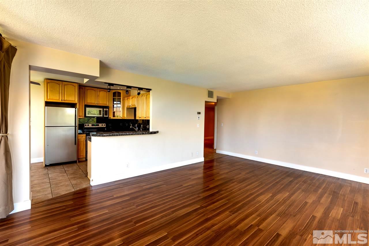 280 Island, Unit 703 Reno, NV 89501 - Photo 4 of 34 a view of a living room with wooden floor