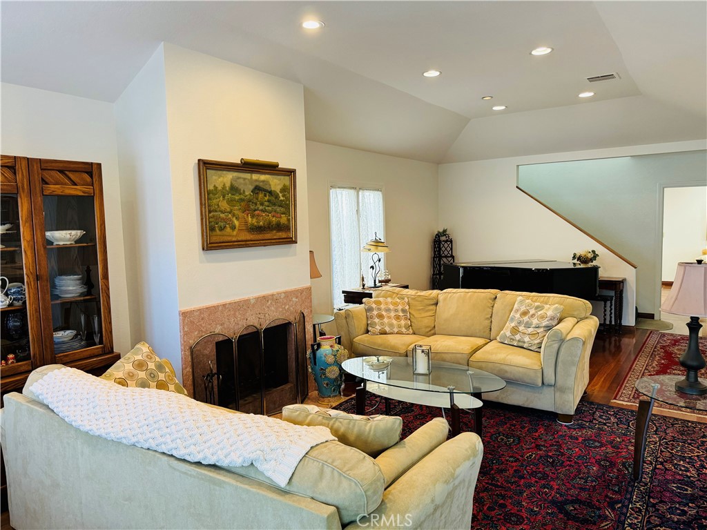 87 Rivo Alto Canal Long Beach, CA 90803 - Photo 11 of 34 a living room with furniture fireplace and a couch