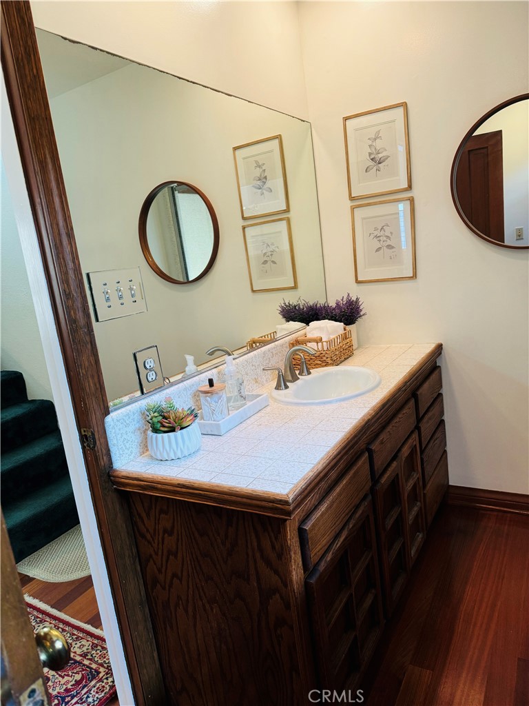87 Rivo Alto Canal Long Beach, CA 90803 - Photo 13 of 34 a bathroom with a sink vanity and a mirror